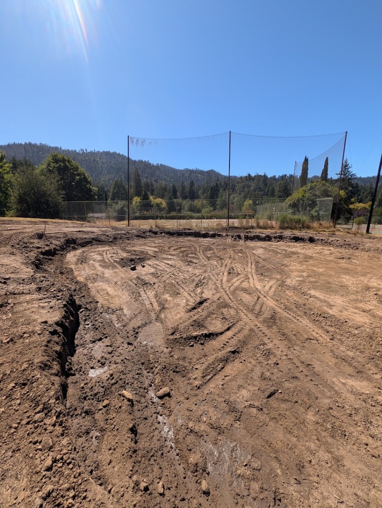 Hole 12 green bowl after excavation, looking toward the hills