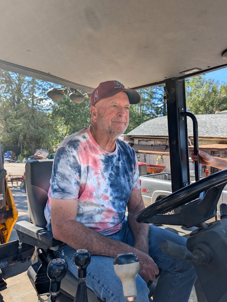 Equipment operator in the cab during back nine work